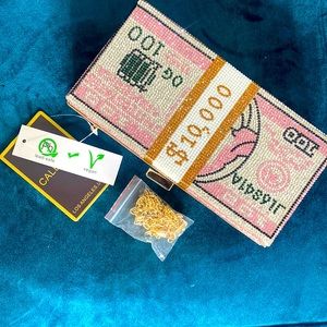 Super cute rhinestone purse. Statement maker. Never used. chain strap included.